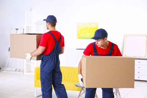 Man and van loading furniture for a local move in Finchley