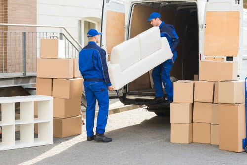Local van service helping with boxed household items in Finchley