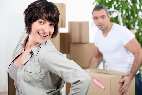 Professional movers handling furniture during Finchley removals
