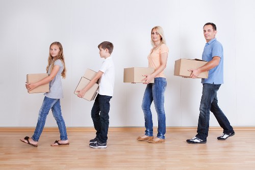 Professional office movers handling furniture in Finchley